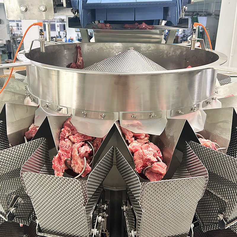 Sistema automatico di pesatura e imballaggio per bistecche ribeye