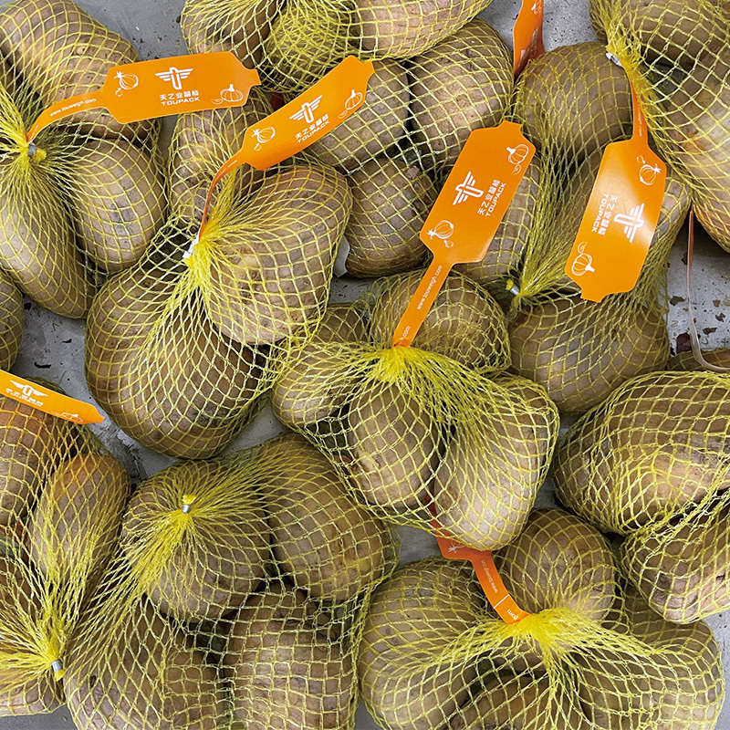 Macchina automatica completa per l'imballaggio e la pesatura di sacchi a rete per verdure, patate, arance e frutta