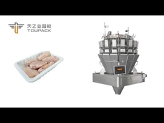 Linea di imballaggio a vassoio di ali di pollo surgelati completamente automatizzata, pesata con precisione da una vite multihea TOUPACK